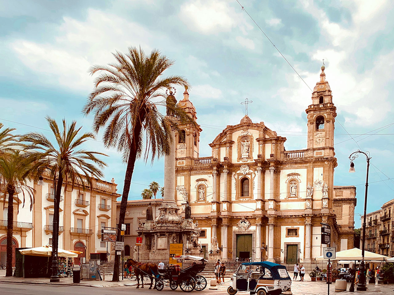 Piazza San Domenico with the church in the background and the palm trees