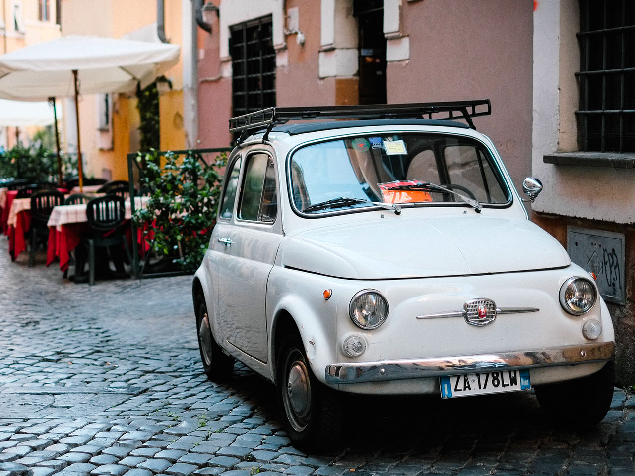 vintage fiat 500 binaca in the streets of the historic center of Palermo