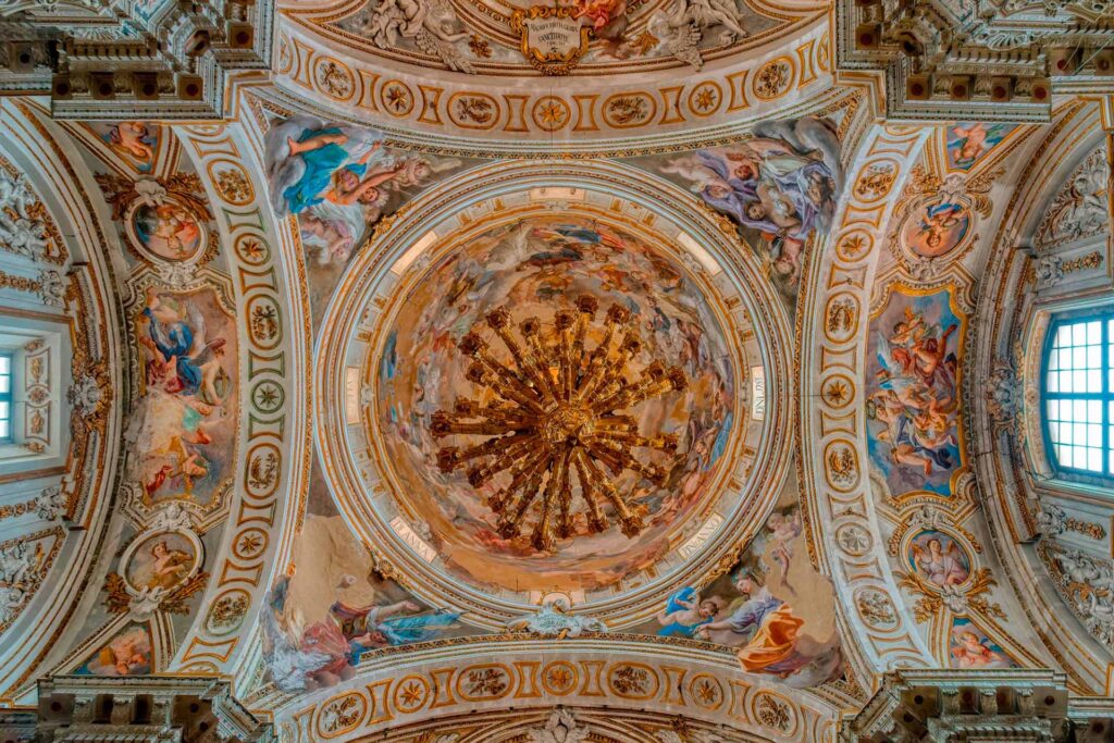view of the baroque ceiling frescoes of Santa Caterina church in Palermo